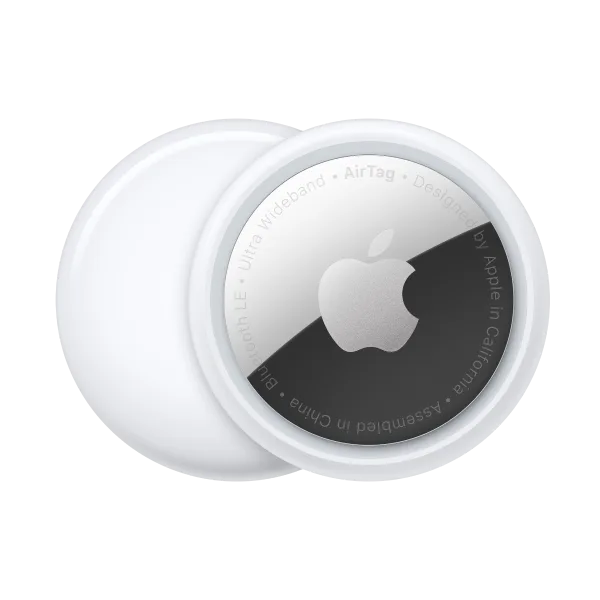 Two sleek, circular AirTag, white on the back and shiny on the front.