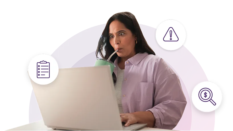 A woman on her laptop with a shocked expression, sipping from a water bottle.