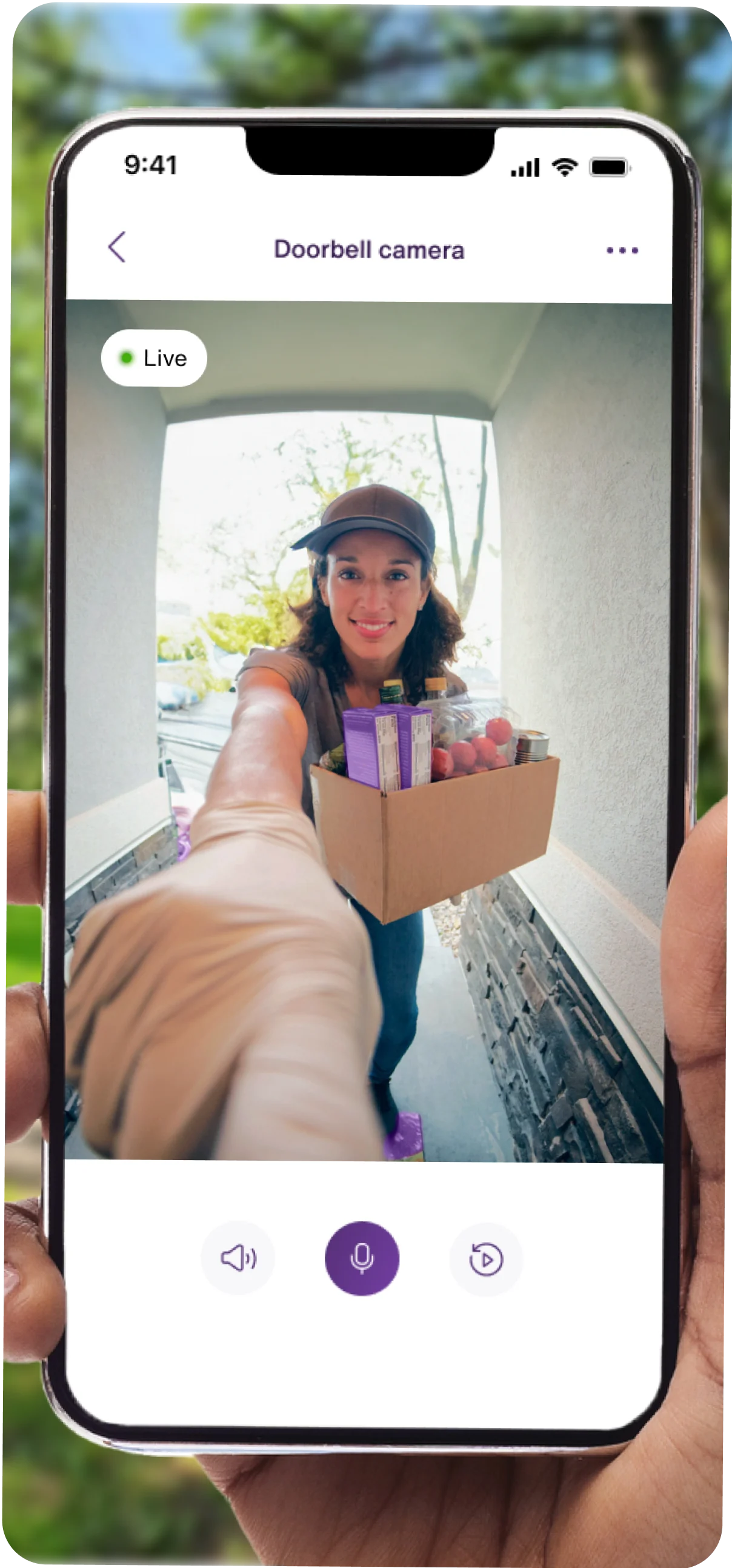 A smartphone shows the view of a doorbell camera remotely,  in which a person rings the bell.