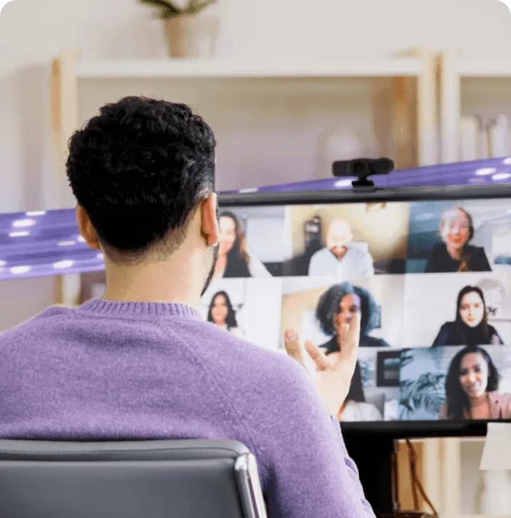 A man attending a video conference.