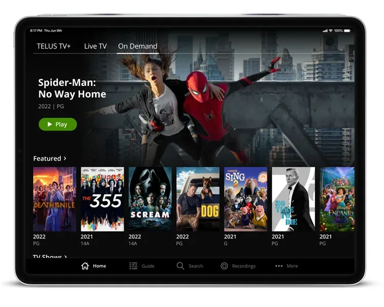 A tablet shows that you have access to a wide array of hit movies and series through the TELUS TV+ app.