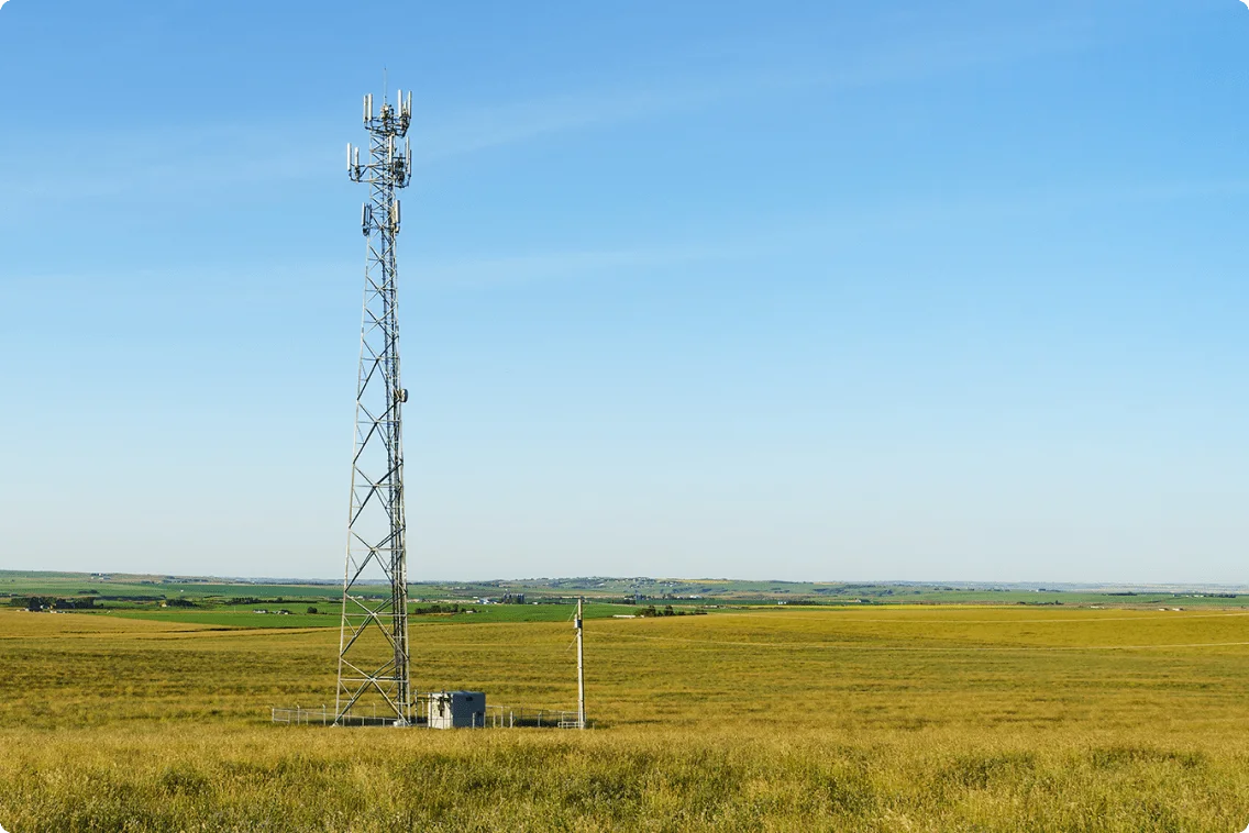 A cellular tower in a field