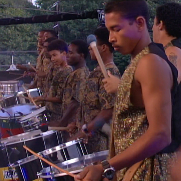 Briz and Grupo Cultural OLODUM during the performance of "The Obvious Child."