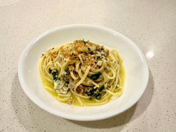 A plate of linguine with canned clam sauce.