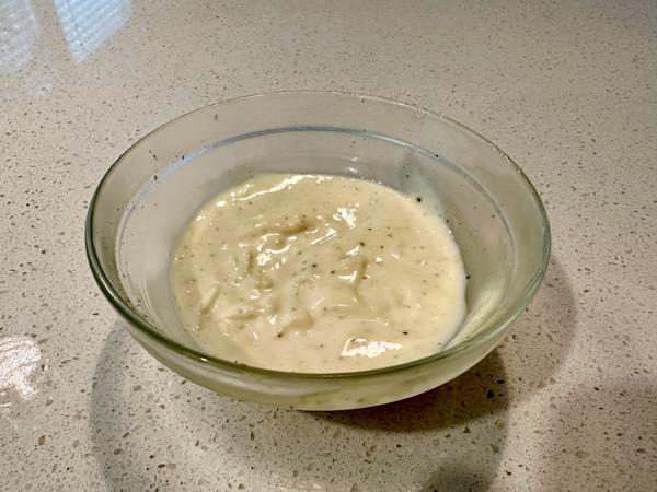 A dish of lemon garlic aioli.