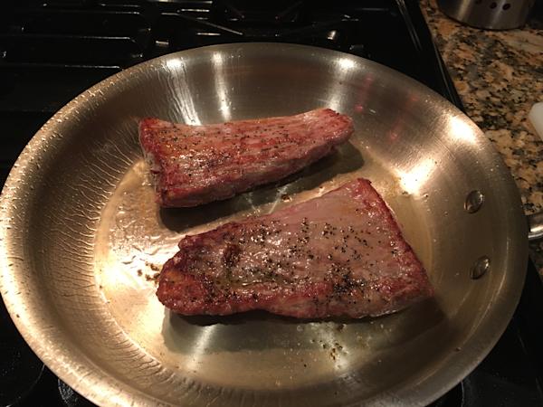 Pan-seared pork tenderloin steaks.