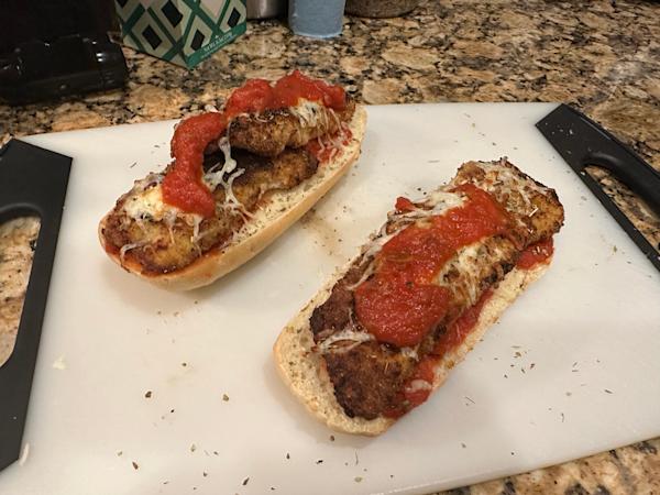 Air fried pork chops with melted mozzarella and marinara sauce.