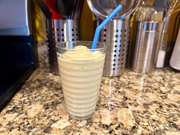 A glass of pineapple cream