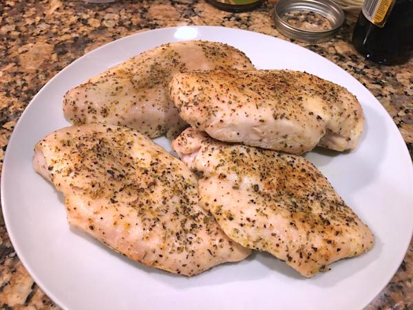 Oven roasted chicken breasts after they have been brined.