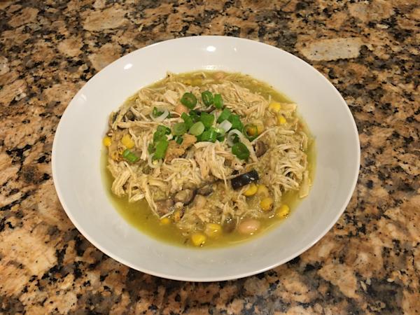 A bowl of green chicken chili