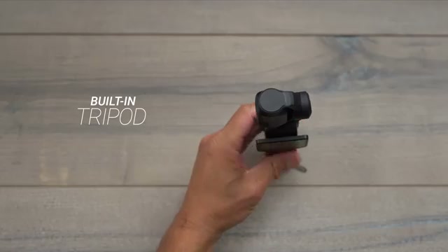 The%20reviewer%20holds%20the%20Insta360%20Luna%20Ultra%20next%20to%20the%20DJI%20Pocket%203%2C%20comparing%20their%20sizes%20and%20physical%20design.