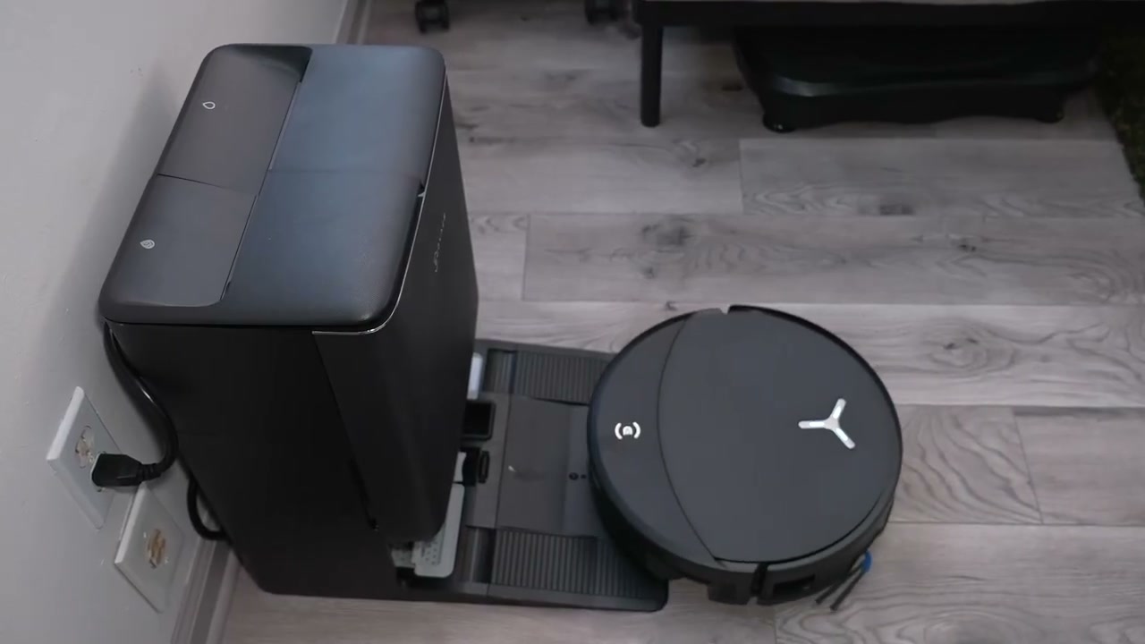 Close-up%20shot%20of%20the%20large%20ECOVACS%20DEEBOT%20T90%20PRO%20OMNI%20Omni%20Station%2C%20highlighting%20its%20size%20and%20design.