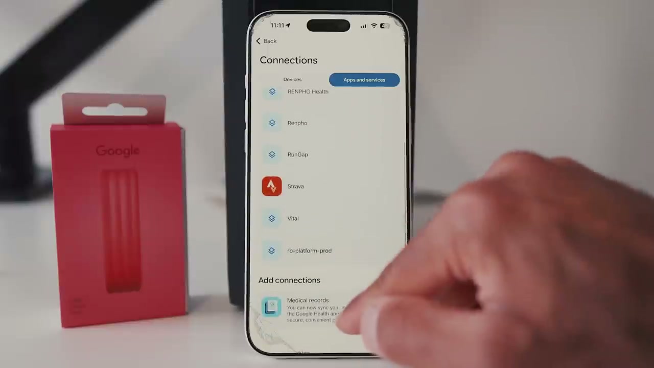 Reviewer%20demonstrating%20the%20Google%20Health%20app%27s%20integration%20with%20multiple%20wearable%20data%20sources%20on%20a%20smartphone%20screen.