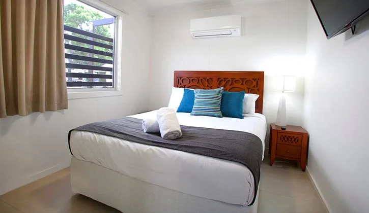 Bedroom inside a beachfront apartment in Agnes Water