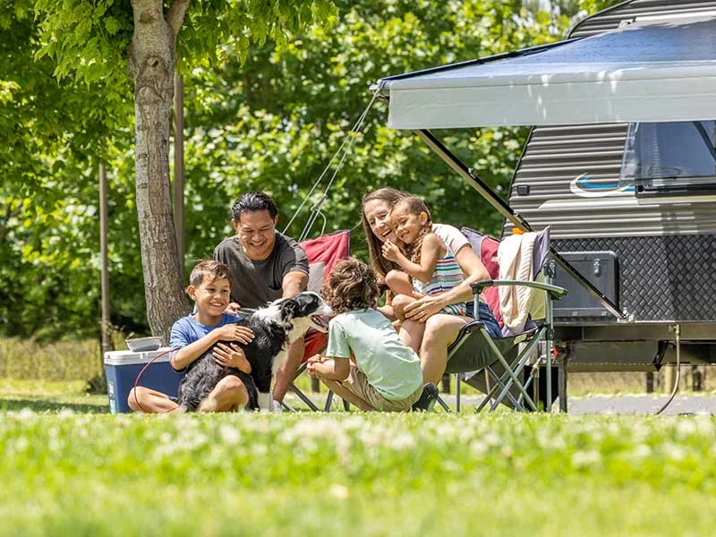 Family with dog at NRMA Broulee Holiday Park