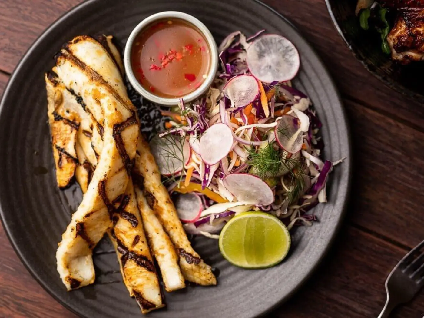 A Grilled calamari in Hamer’s Bar & Bistro at Strahan Village