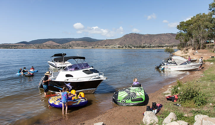 Several boats moored on the shore at Lake Somerset