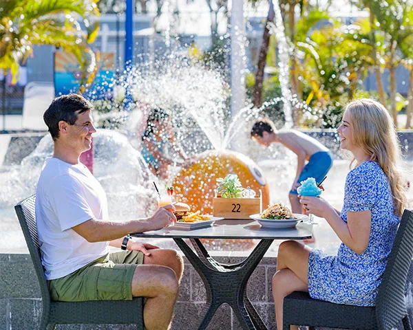Couple having lunch at Treasure Island Gold Coast holiday park