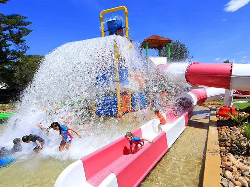 Children playing in the waterslide at Tathra Beachside Holiday Park
