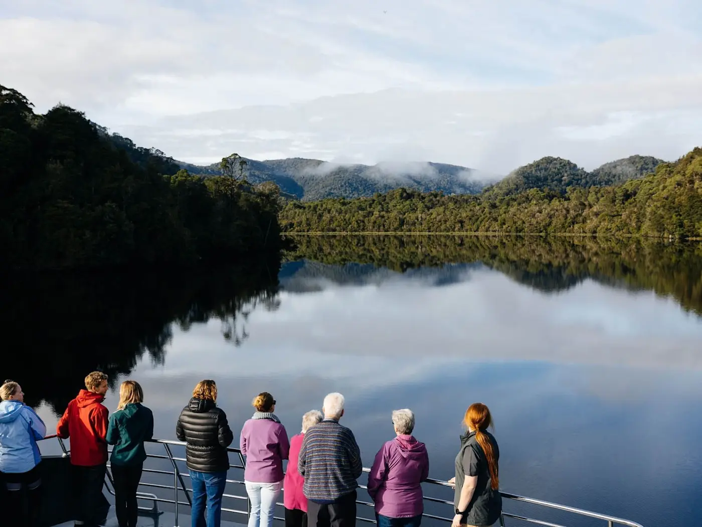 People watching the River from the ship near Strahan Village