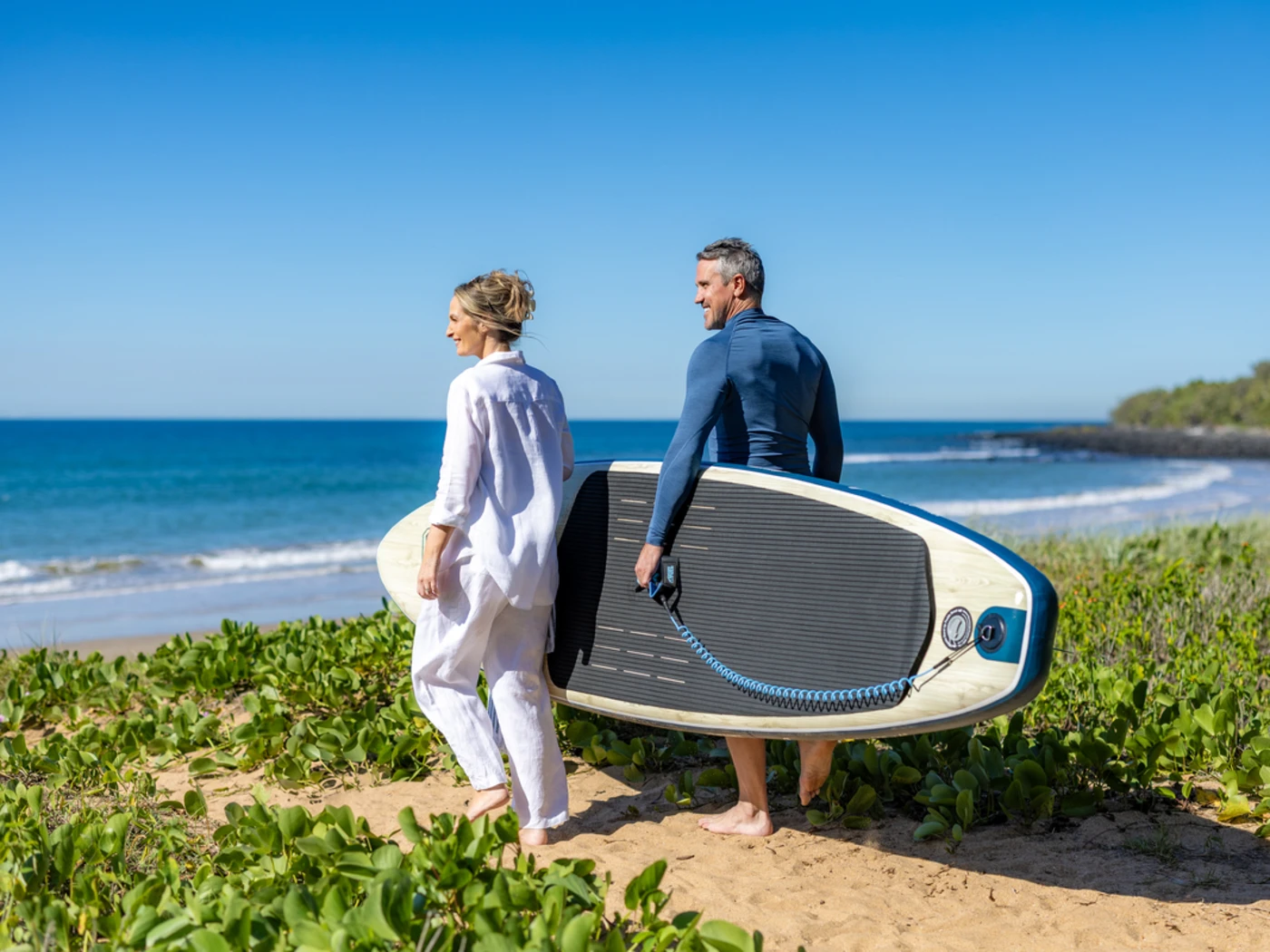 Stand up paddle boarding at NRMA Parks and Resorts