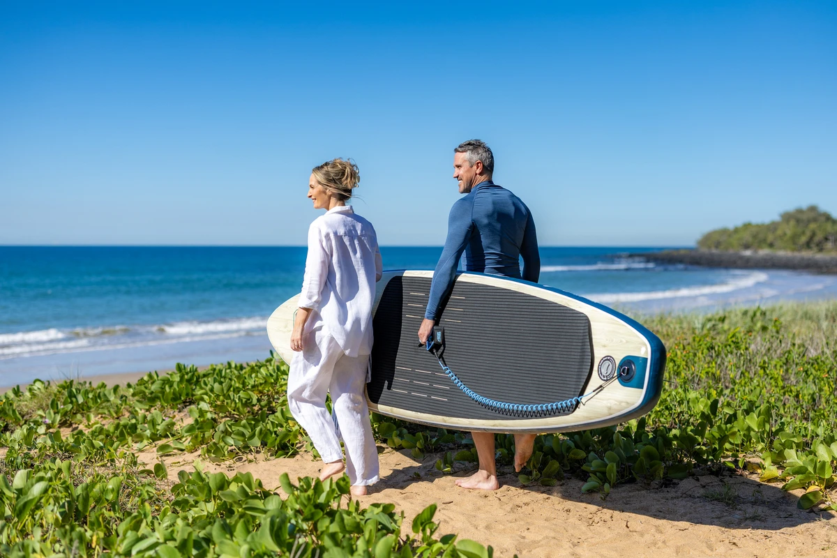 Stand up paddle boarding at NRMA Parks and Resorts