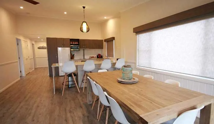 Kitchen adn dinning room of cabin at Tathra Beachfront Holiday Park