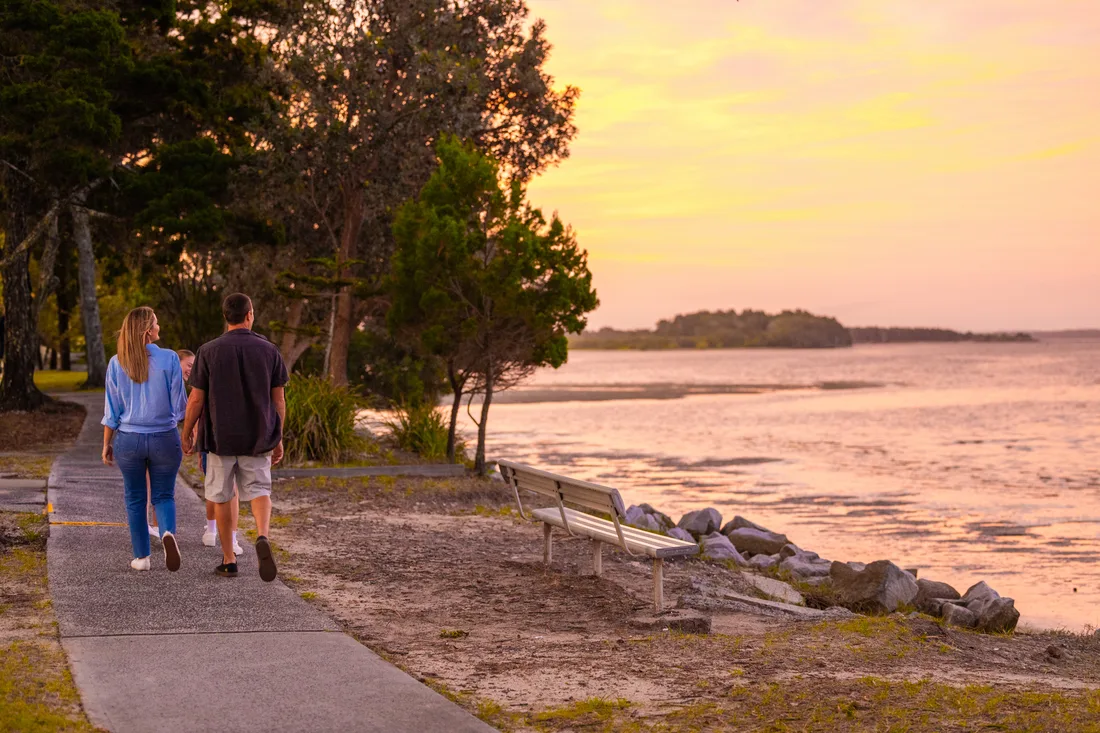 family walking on Clarence River