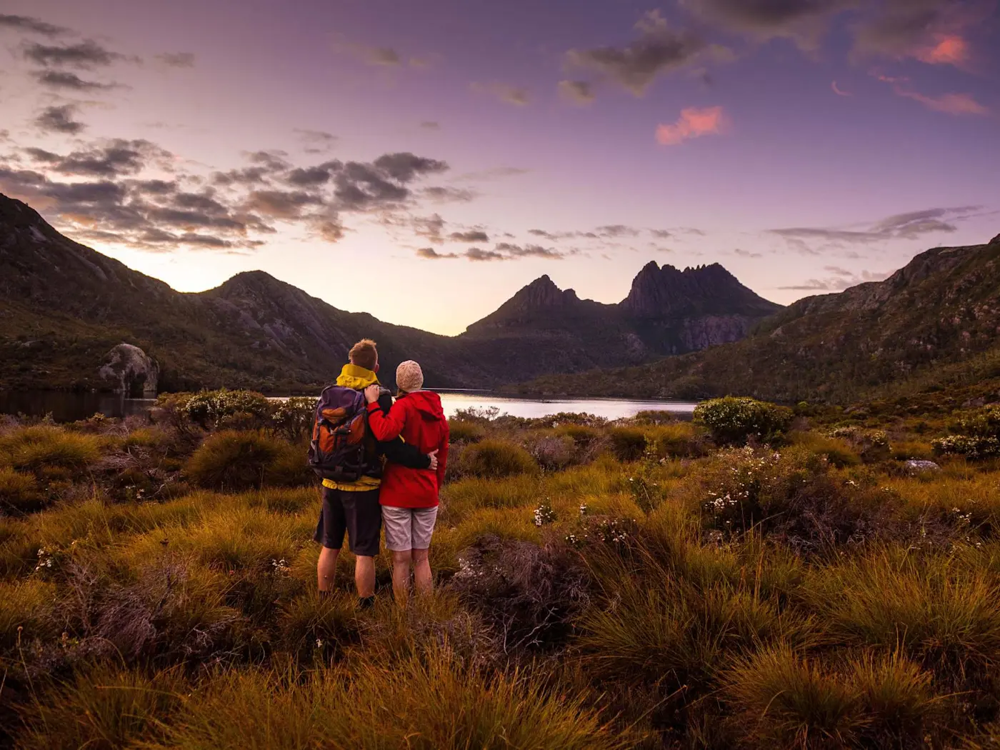 Couple watching at Dove Lake at Cradle Mountain Hotel