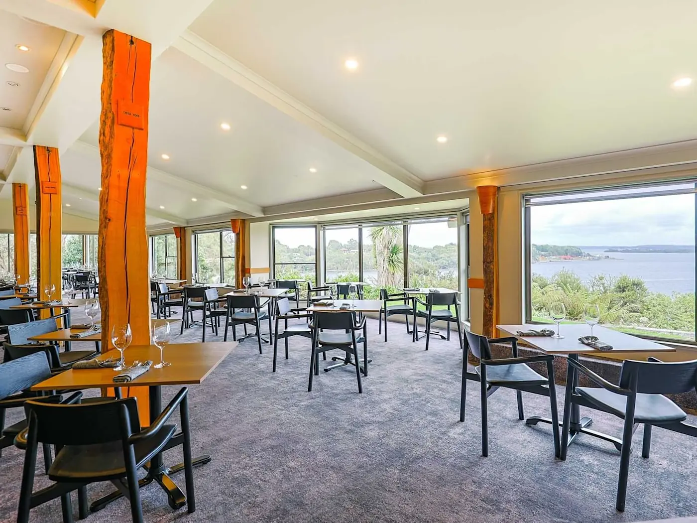 Tables arranged in View 42° Restaurant and Bar at Strahan Village