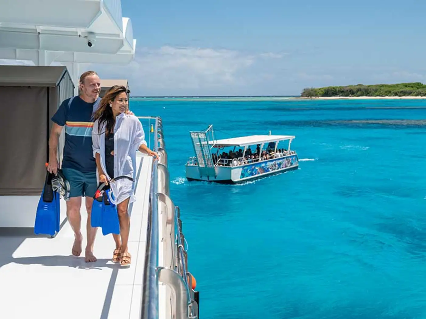 Couple taking a day trip from Bundaberg to Lady Musgrave Island on the Lady Musgrave Experience.