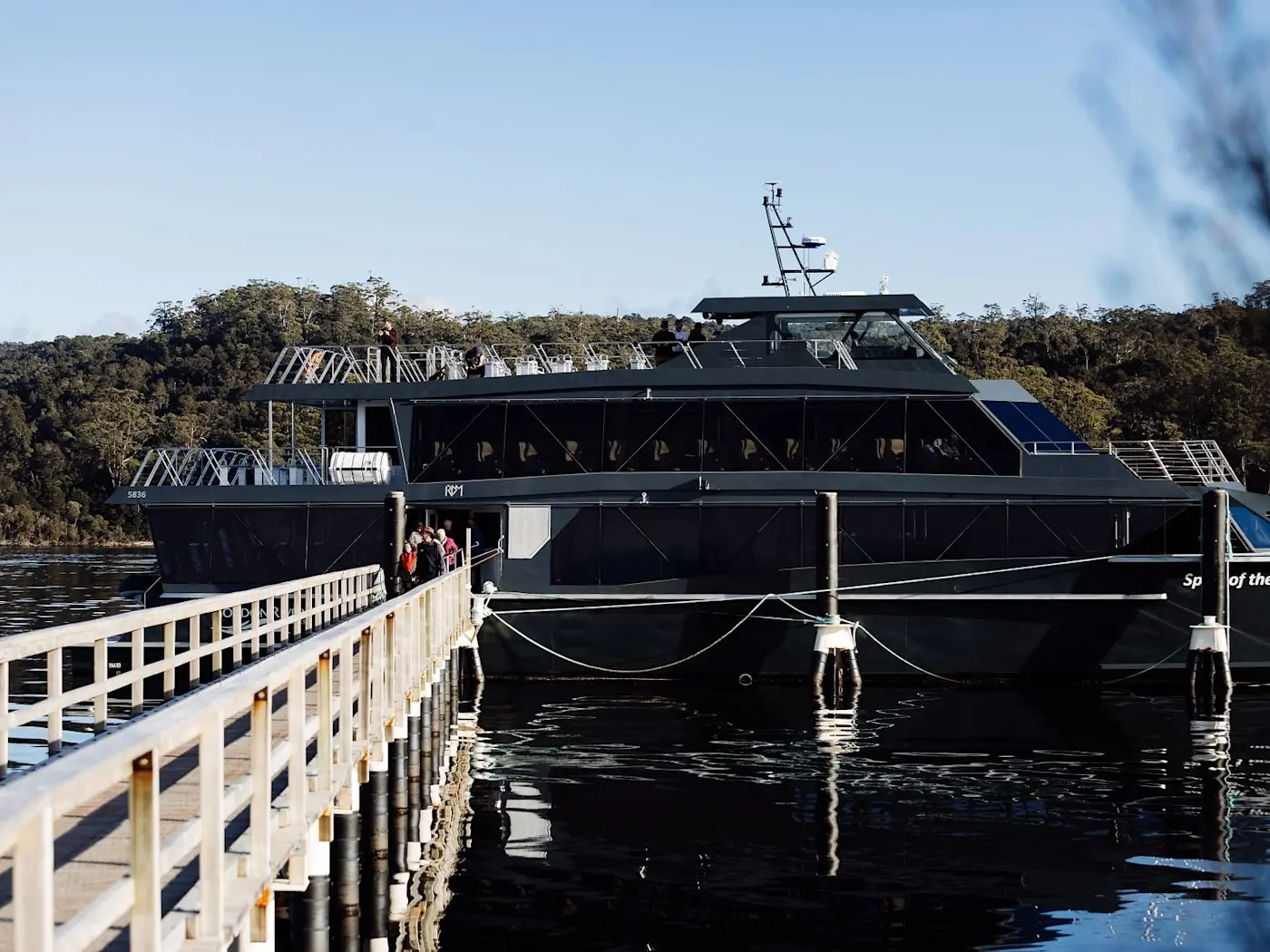 A boat stationing on a Lake near Gordon River Cruise