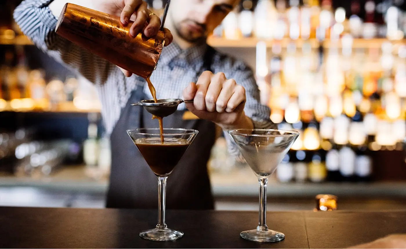 Bartender preparing drinks in Hazards Bar at Freycinet Lodge