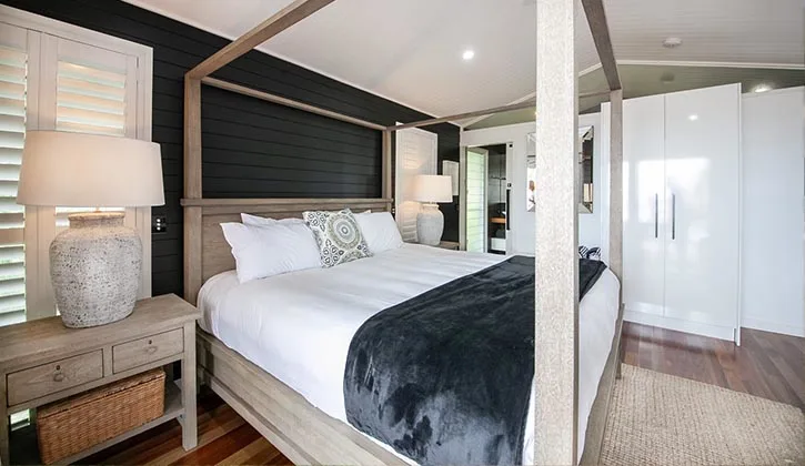 stylish bedroom inside a holiday bungalow in Agnes Water