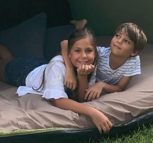 Two children in a tent