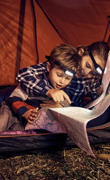 Family camping in a tent