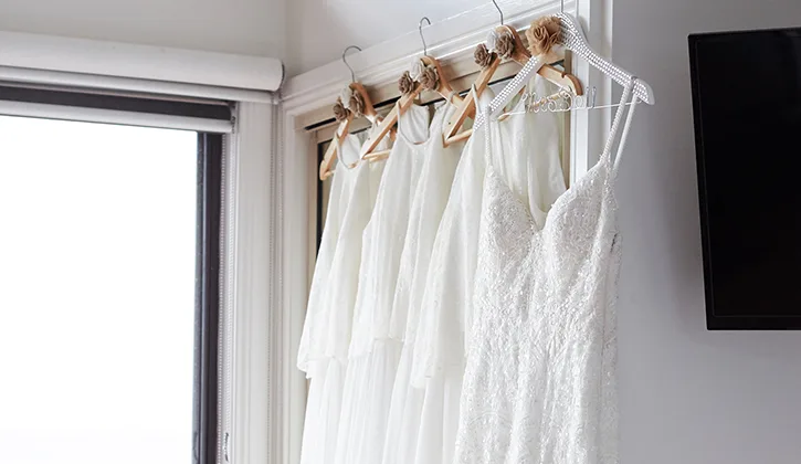 Bride and bridesmaids dresses hanging