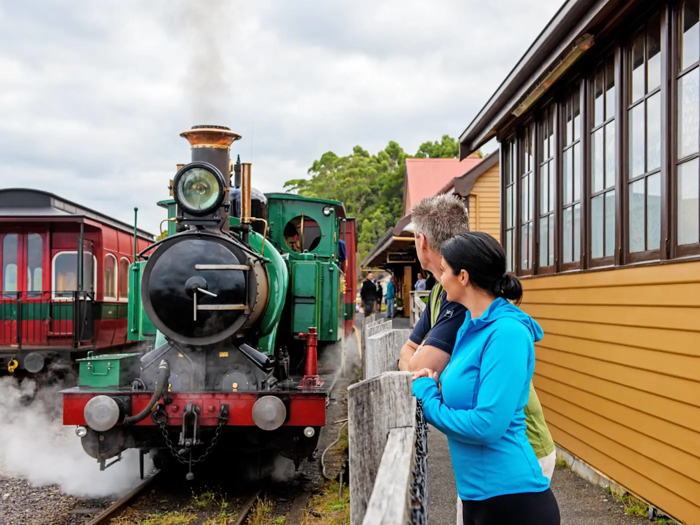 A couple at the train station near Strahan Village