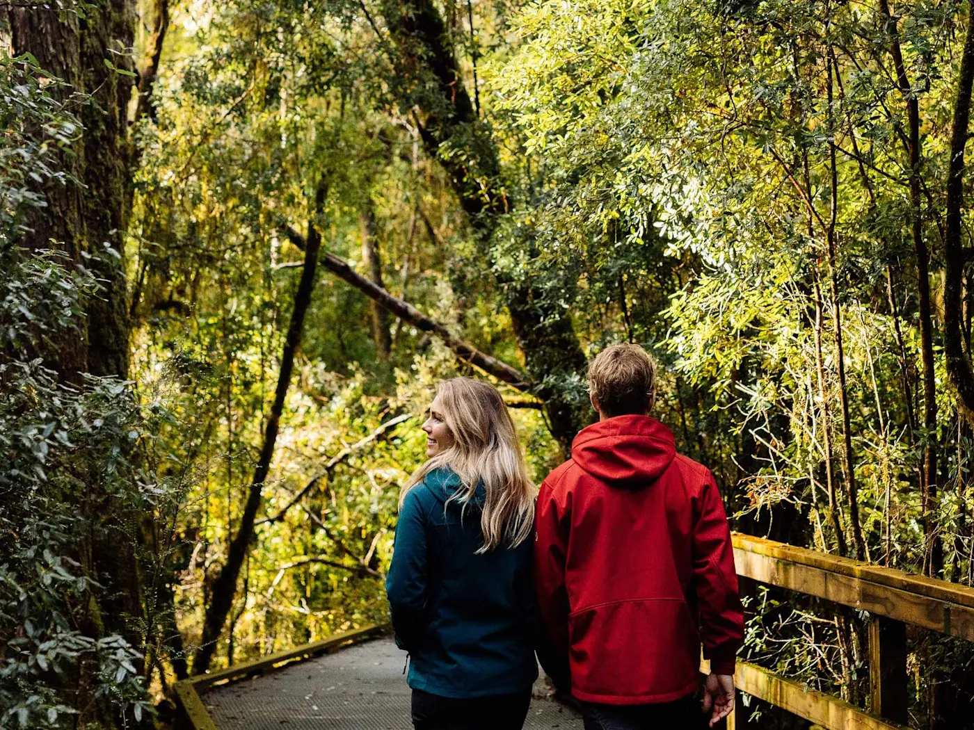 Couple enjoy a scenic walk near Strahan Village