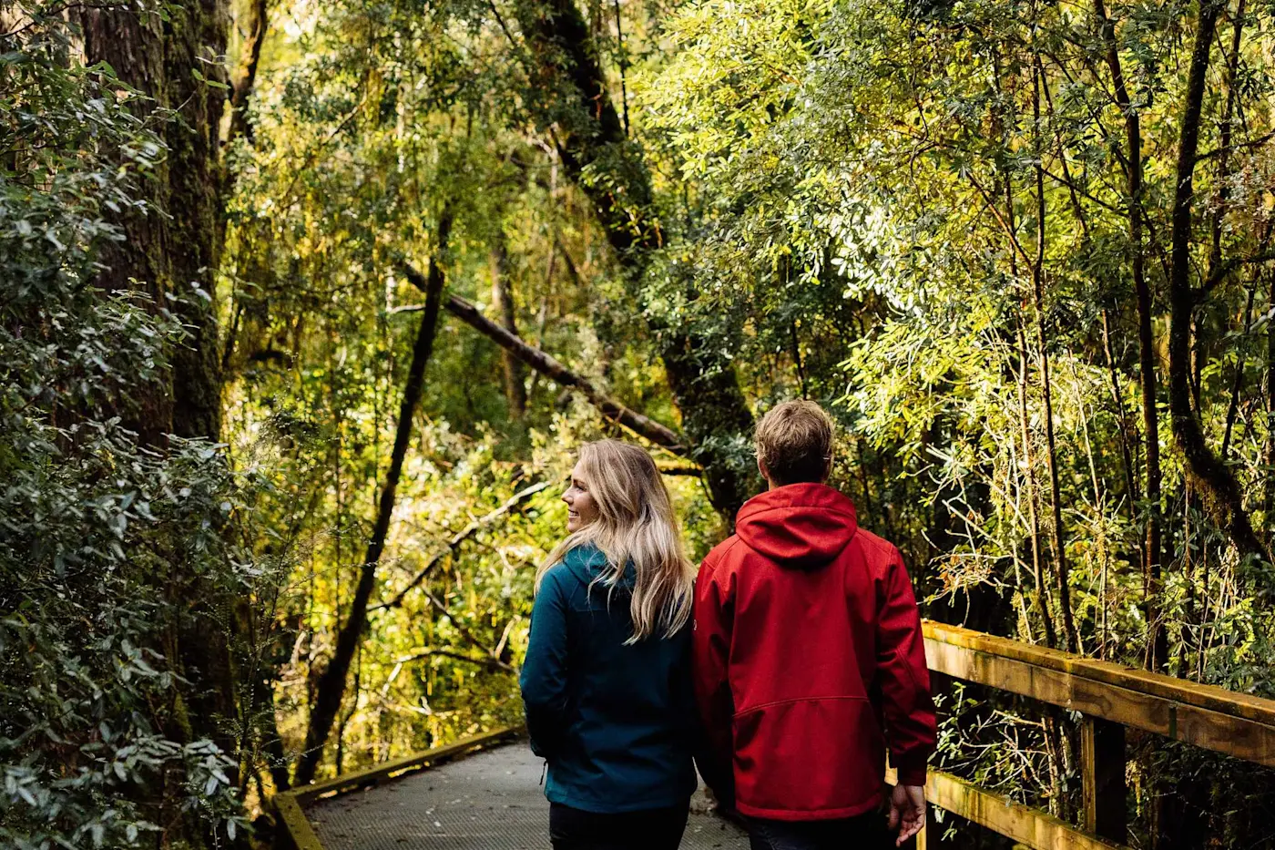 Couple enjoy a scenic walk near Strahan Village