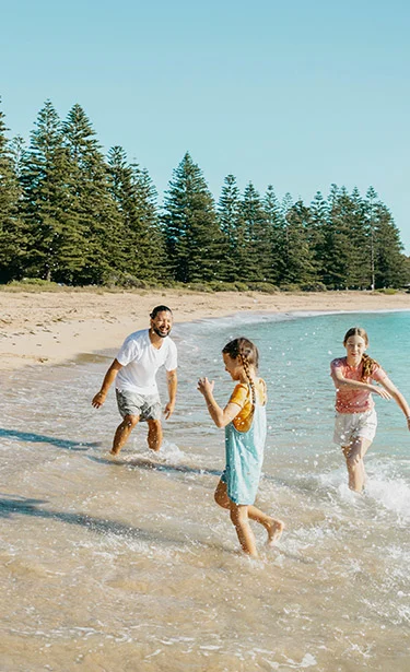 Family having fun at Murramarang beach