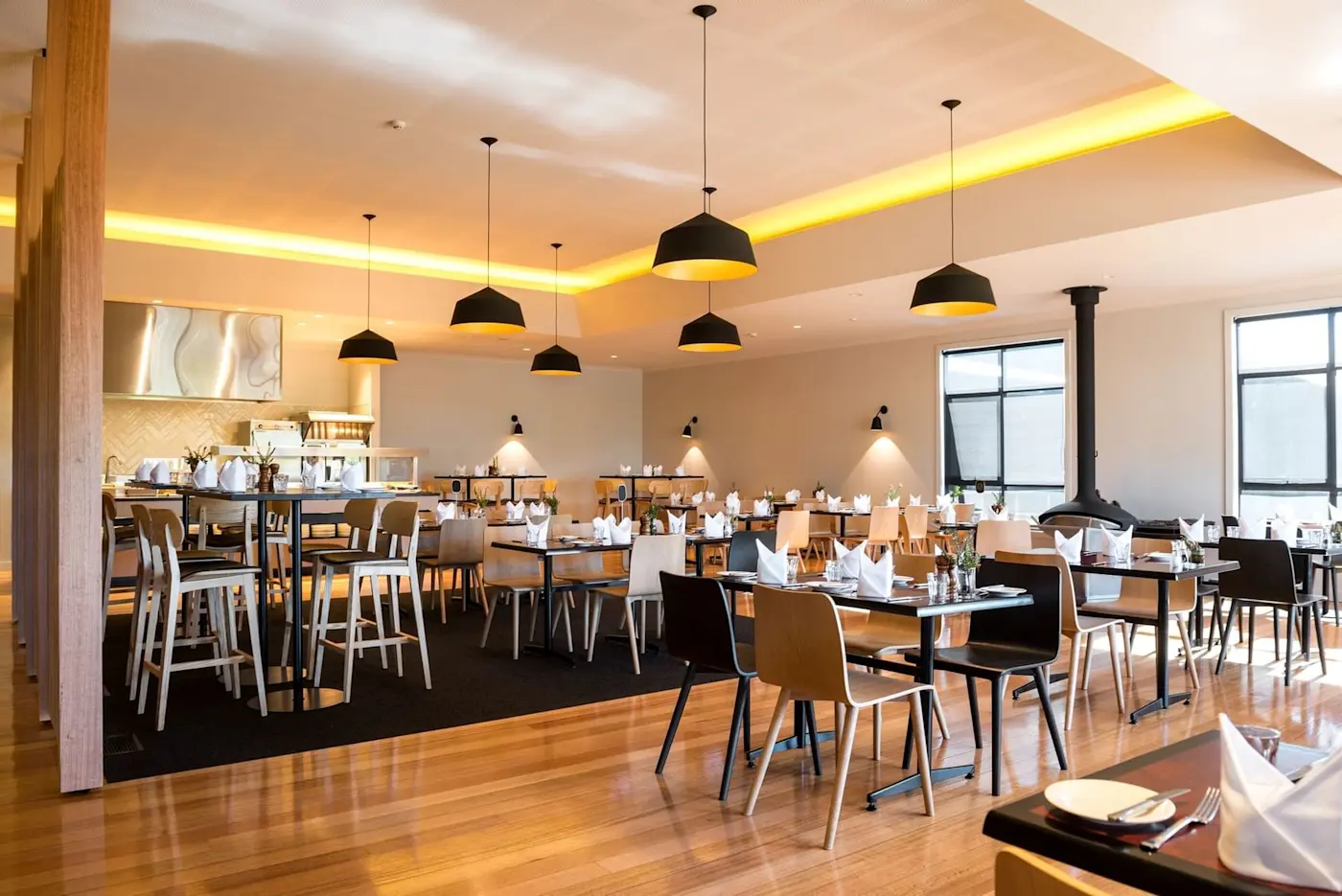 Dining tables arranged in Altitude Restaurant at Cradle Mountain Hotel
