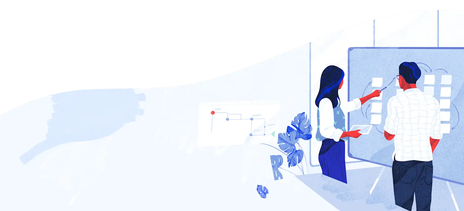 People chatting around a whiteboard