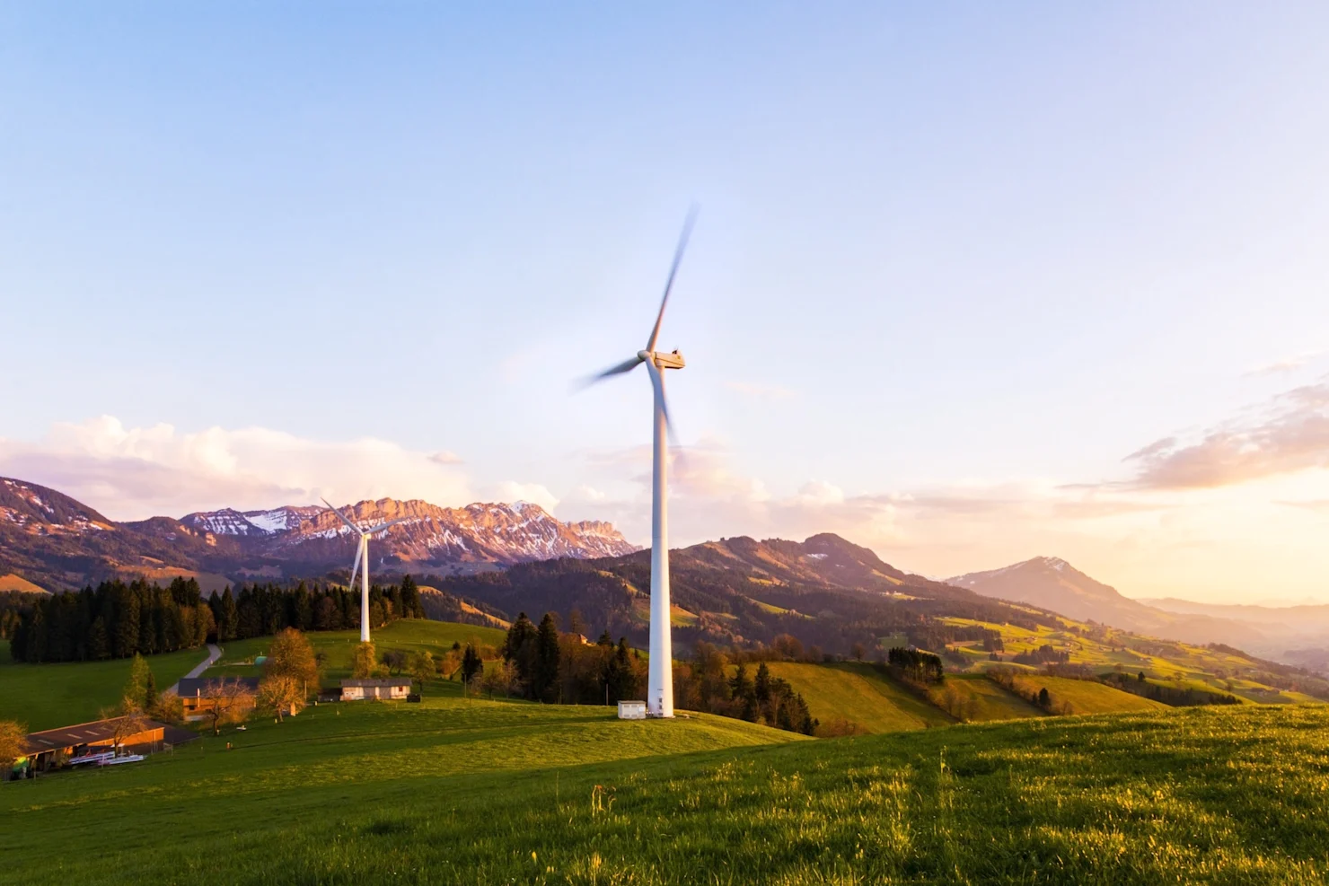 A wind farm overlooking some hills