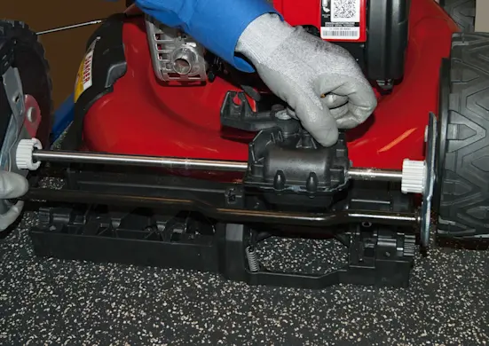 PHOTO: Remove the transmission and wheel axle.