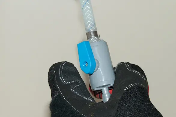 PHOTO: Open the water supply valve.