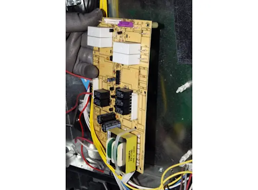 PHOTO: Remove the relay control board.