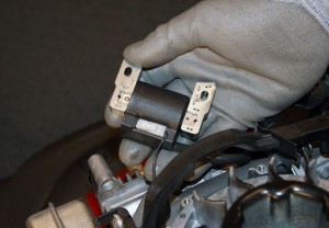 PHOTO: Lift the ignition coil up.