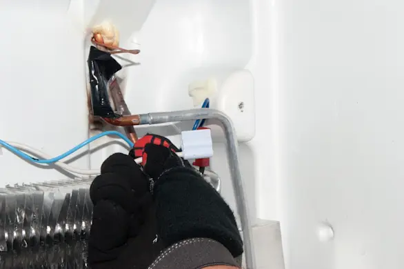 PHOTO: Release the defrost thermistor.