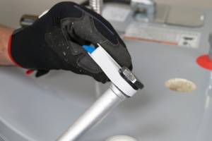 PHOTO: Apply thread sealing tape to the anode rod threads.